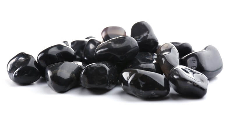 A pile of Black Onyx healing stones