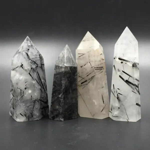 Four pieces of Black Rutilated Quartz Crystal Towers/points