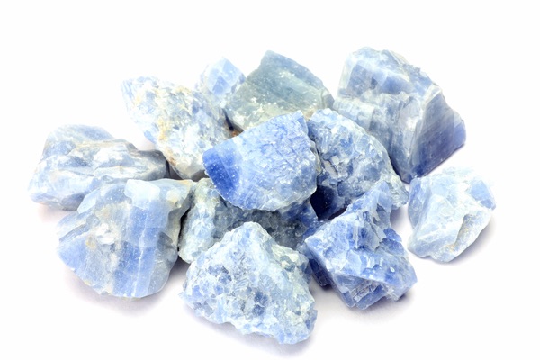 A group of Blue Calcite crystals in a pile