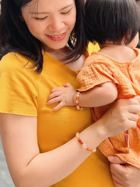 Yohana with here daughter with their Healing Stone Bracelets with crystals for new moms