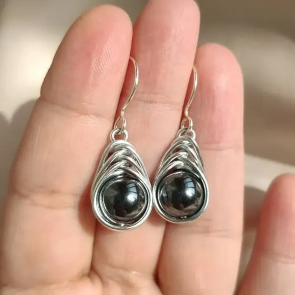 Hematite ball wire wrapped silver earrings in Herringbone shape