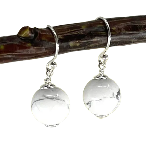 A pair of Howlite dangle ball earrings