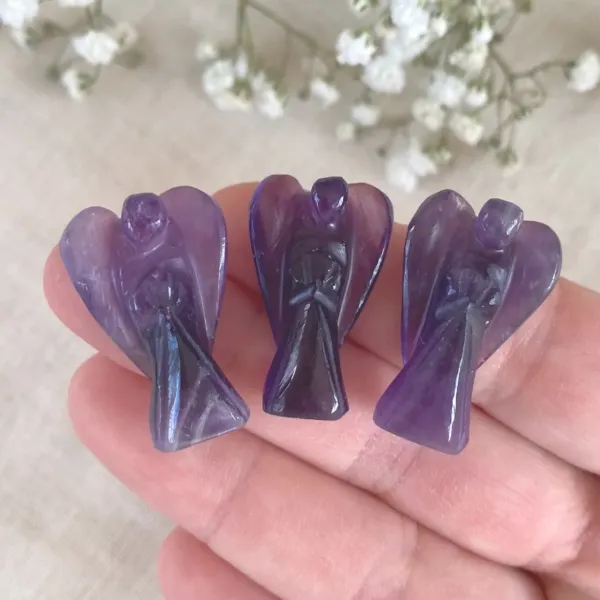 Three Amethyst Guardian Angels on the hand