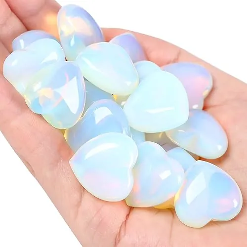 Opalite Polished Carved Hearts on palm of the hand