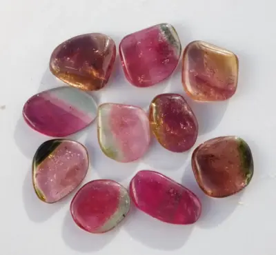 A group of Tourmaline Pink and Green Polished Slices