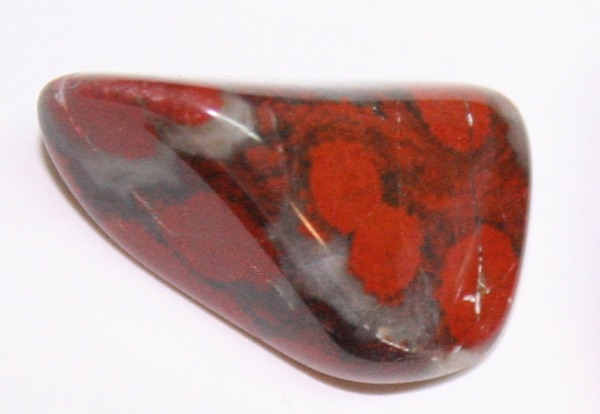 A polished Poppy Jasper stone