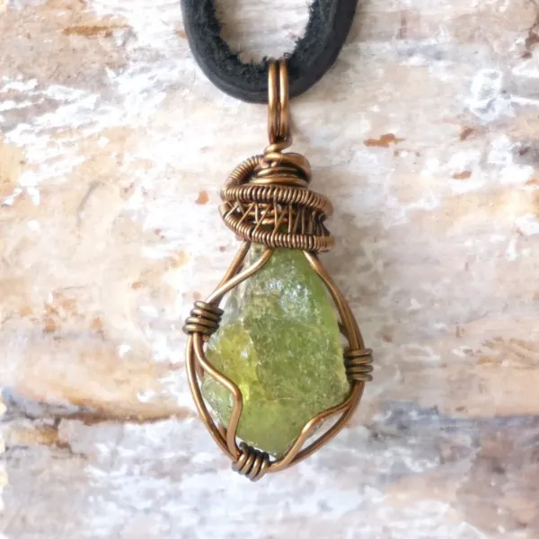 Raw green Peridot Necklace for Men with bronze wiring.