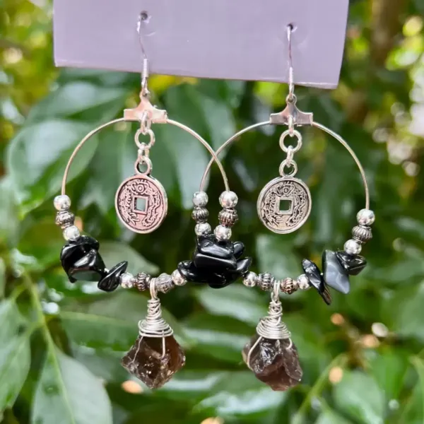 A pair of Smoky Quartz and Silver Onyx hoop earrings