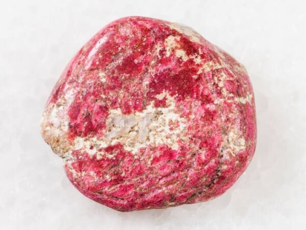 A rough Thulite stone