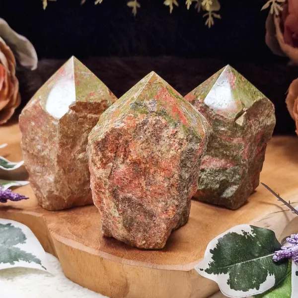 Three pieces of unakite obelisk towers