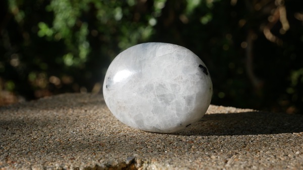 A round piece of White Moonstone