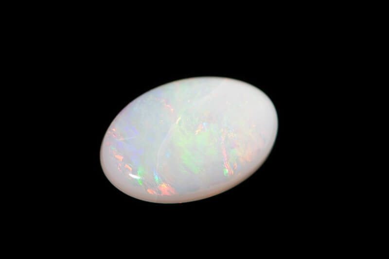 A polished White Opal stone